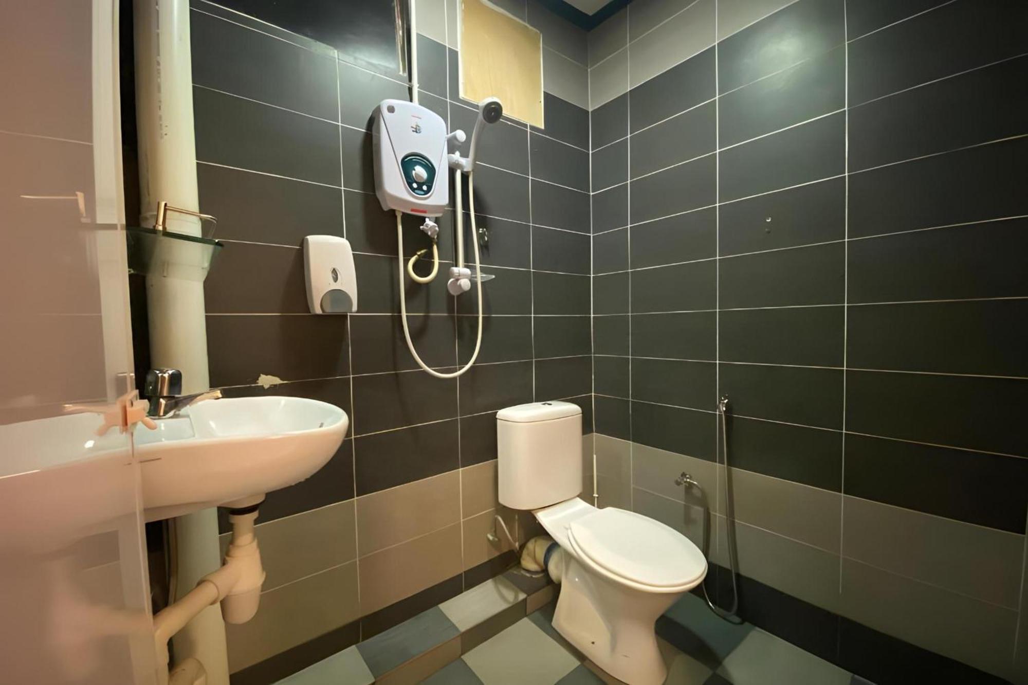 Super Oyo 89807 My Budget Home Бату-Ферринги Экстерьер фото